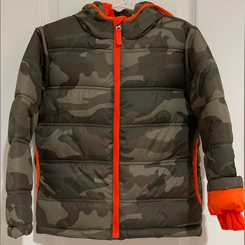 Never worn but washed, Kids Size XSmall (4-5) Camouflage Puffer Jacket w/hoodie.